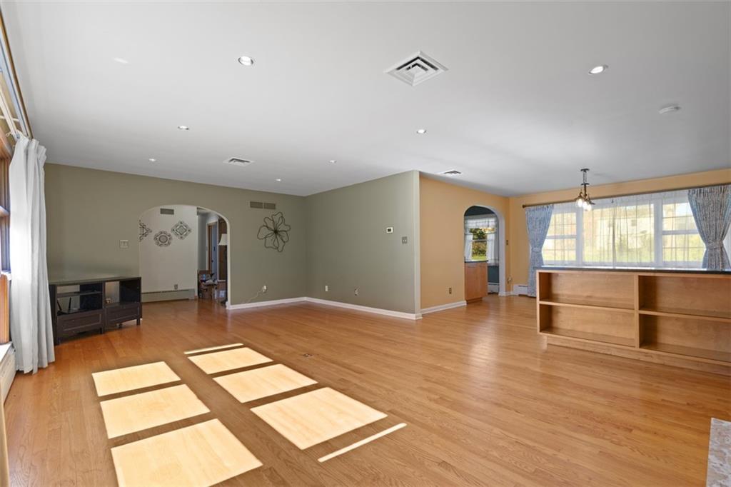 208 Summit Road Butler, PA 16001 - Photo 7 of 33 wooden floor in an empty room with a window