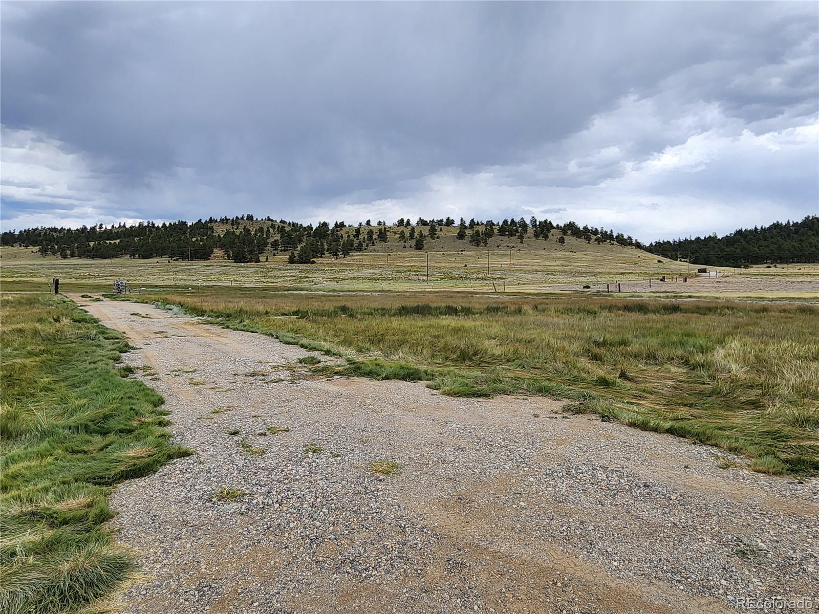 161 Fourmile Creek Road Hartsel, CO 80449 - Photo 25 of 31 a view of a lake with a city