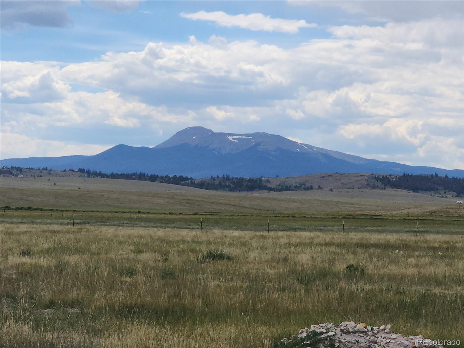 161 Fourmile Creek Road Hartsel, CO 80449 - Photo 28 of 31 a view of a lake and mountain