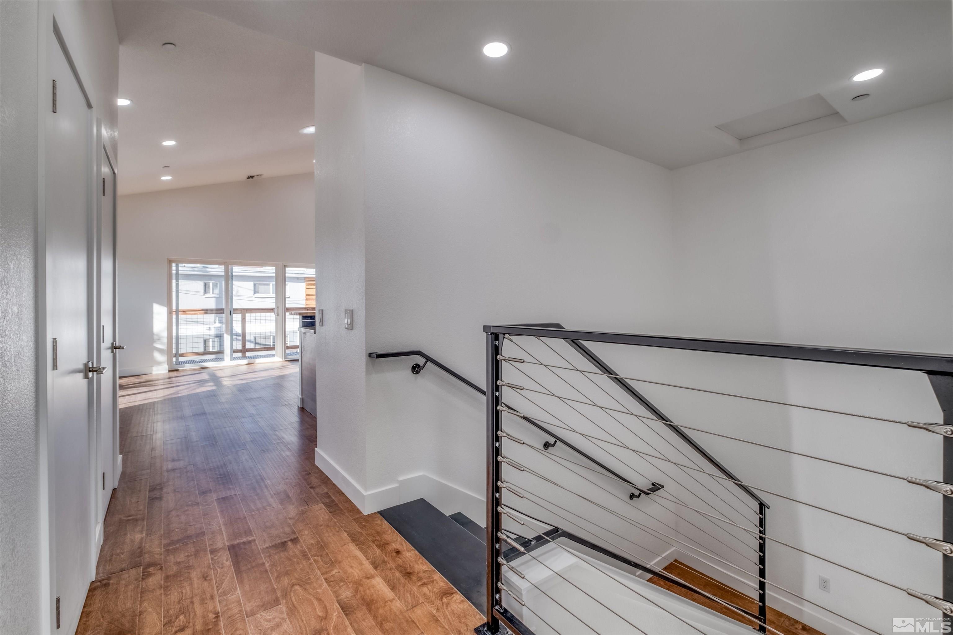 335 Roberts Street Reno, NV 89502 - Photo 14 of 18 a view of entryway with wooden floor