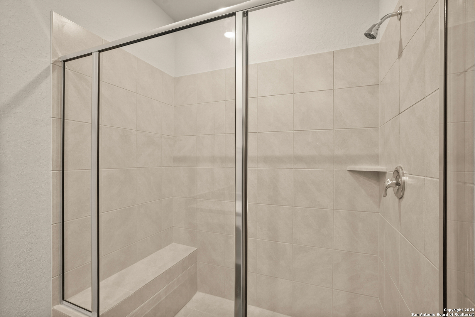 13624 Helton Pass St. Hedwig, TX 78152 - Photo 13 of 35 a bathroom with a shower and a bath tub