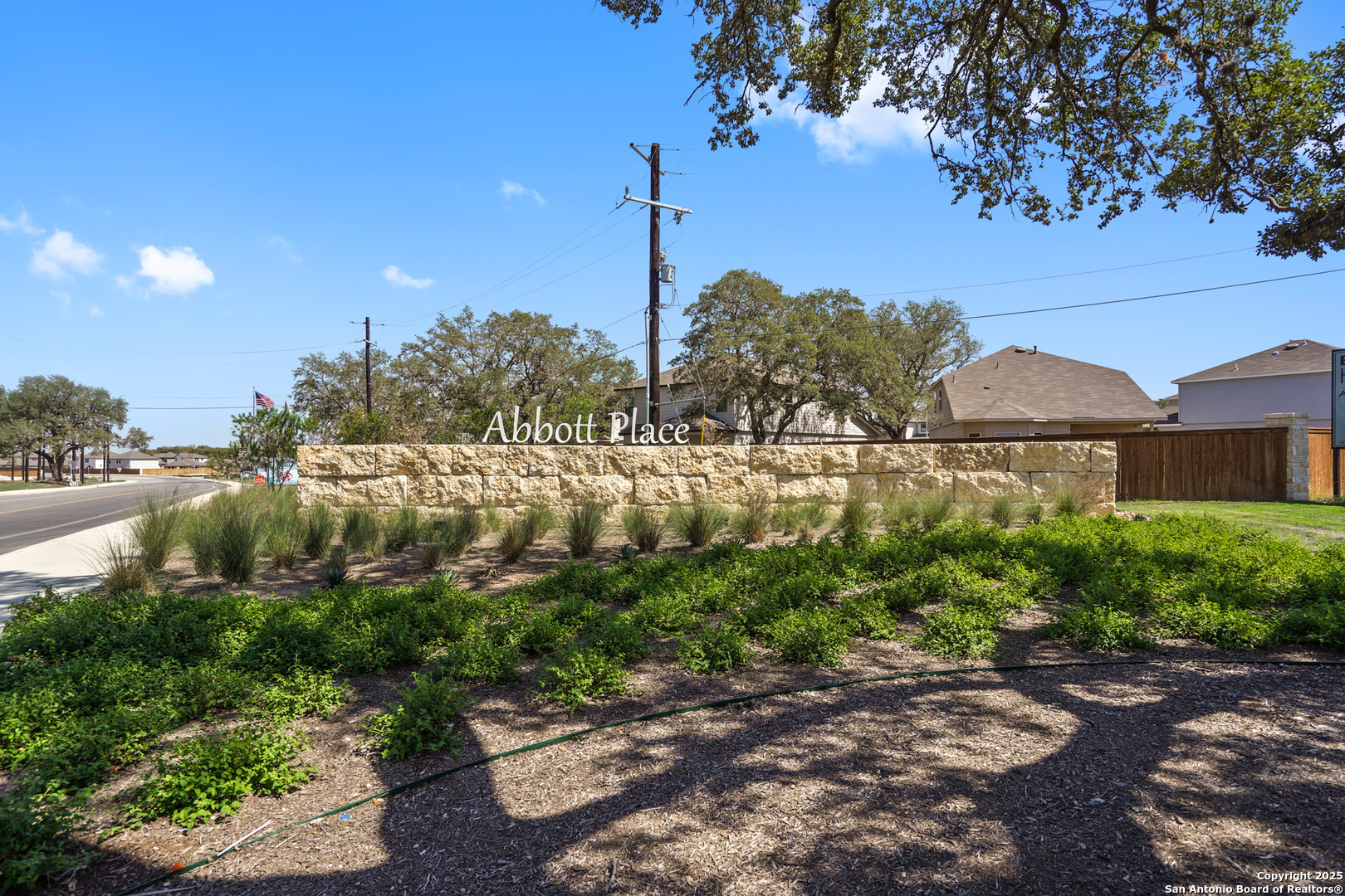 13624 Helton Pass St. Hedwig, TX 78152 - Photo 33 of 35 a view of a lake with a house in background