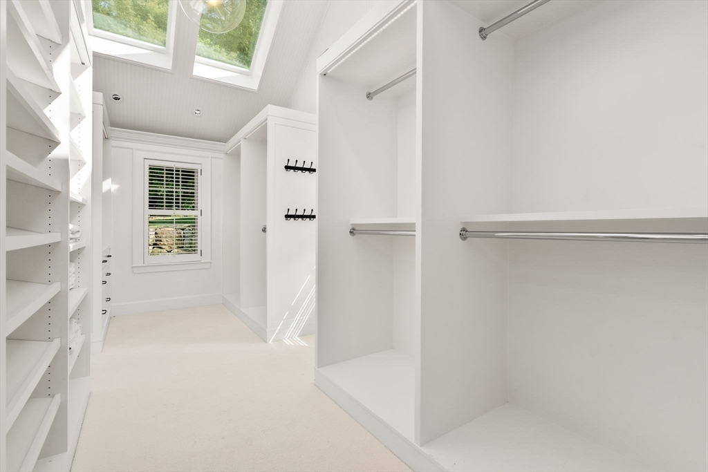 339 Pope Road Concord, MA 01742 - Photo 19 of 40 a view of an empty room with a window