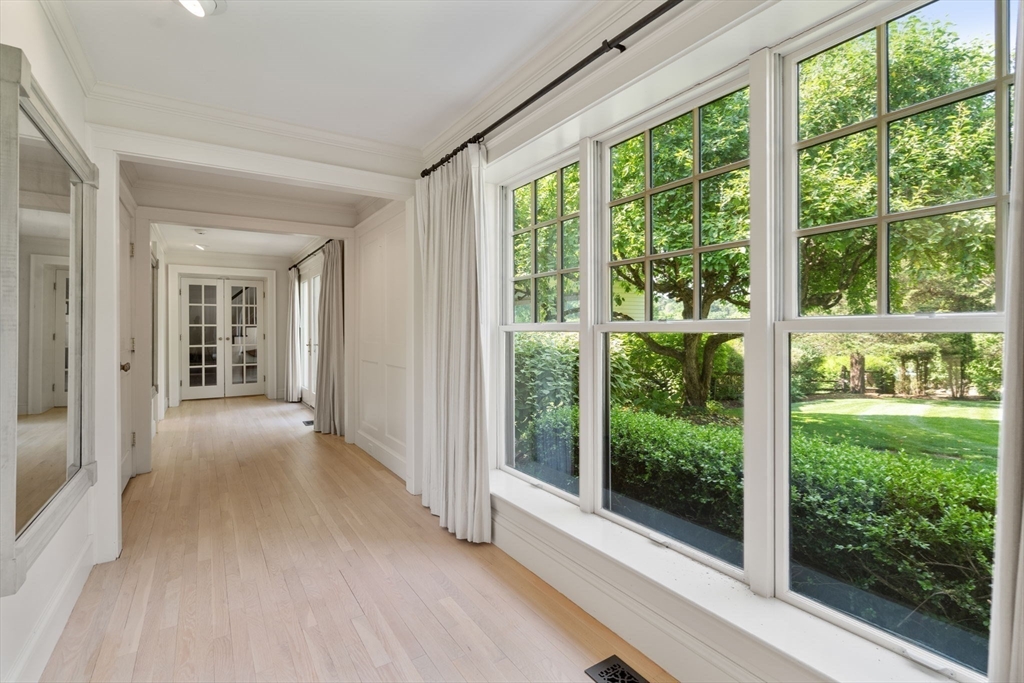 339 Pope Road Concord, MA 01742 - Photo 21 of 40 a view of a room with window wooden floor and garden