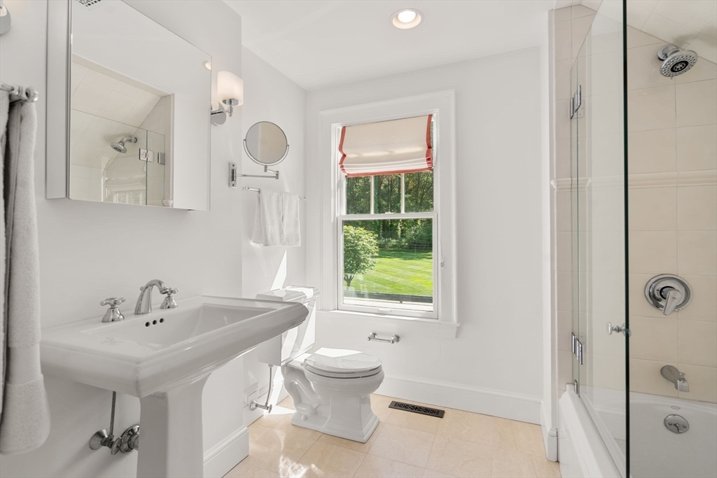 339 Pope Road Concord, MA 01742 - Photo 28 of 40 a bathroom with a sink a toilet and shower