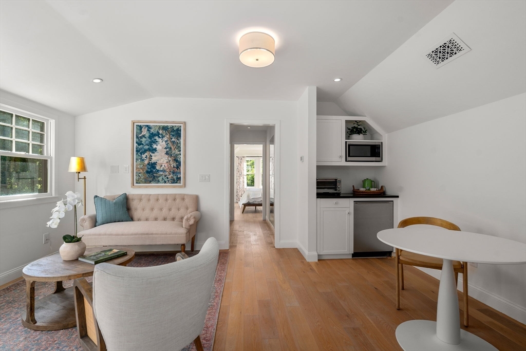 339 Pope Road Concord, MA 01742 - Photo 29 of 40 a living room with furniture and wooden floor