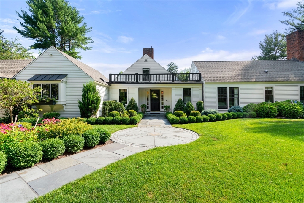 339 Pope Road Concord, MA 01742 - Photo 3 of 40 a front view of a house with a yard