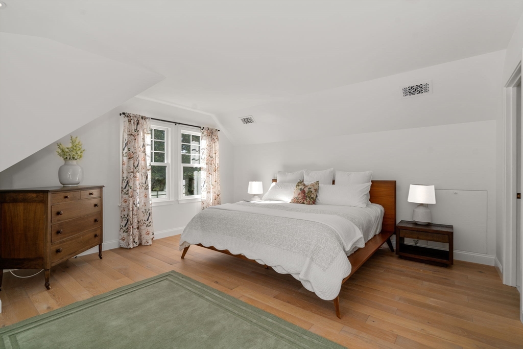 339 Pope Road Concord, MA 01742 - Photo 31 of 40 a bedroom with a bed and a cabinets