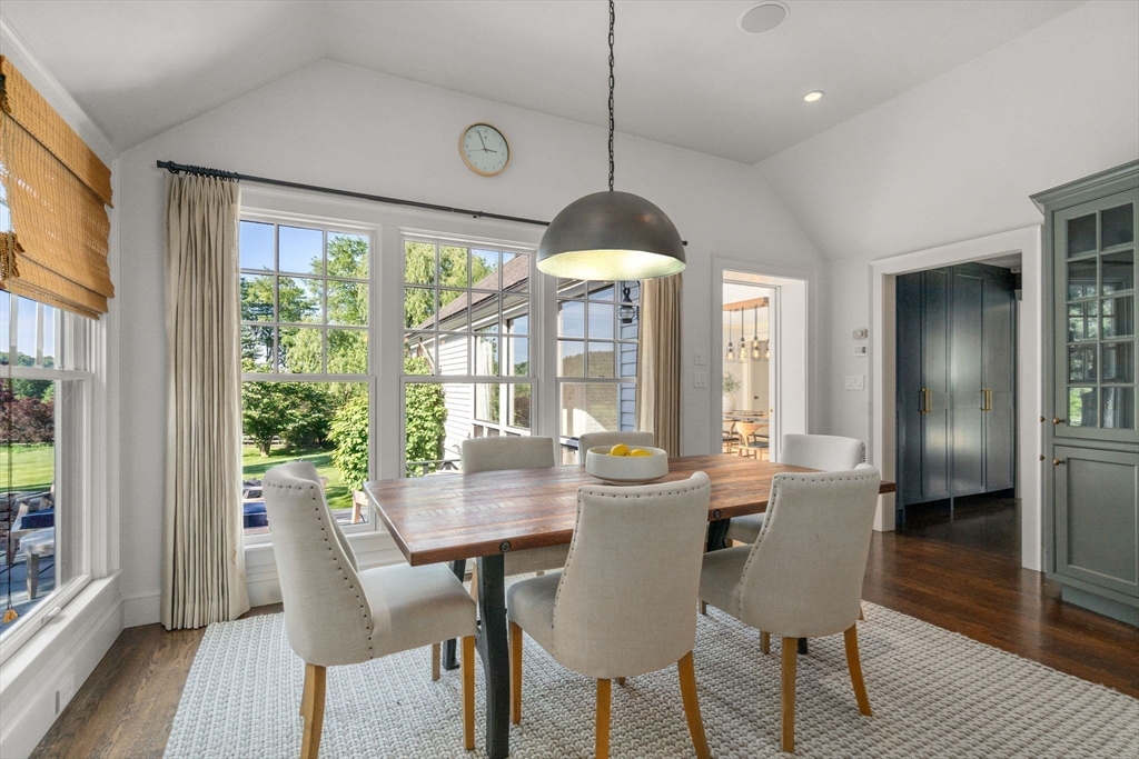 339 Pope Road Concord, MA 01742 - Photo 9 of 40 a view of a dining room with furniture window and wooden floor