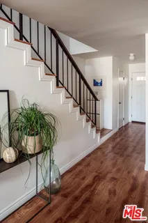 a view of entryway with wooden floor