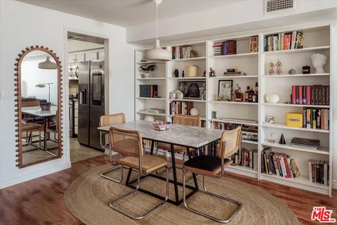 a view of a workspace with furniture and toys