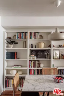 a room with a book shelf