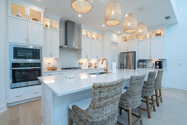 a view of a house with backyard sitting area and garden