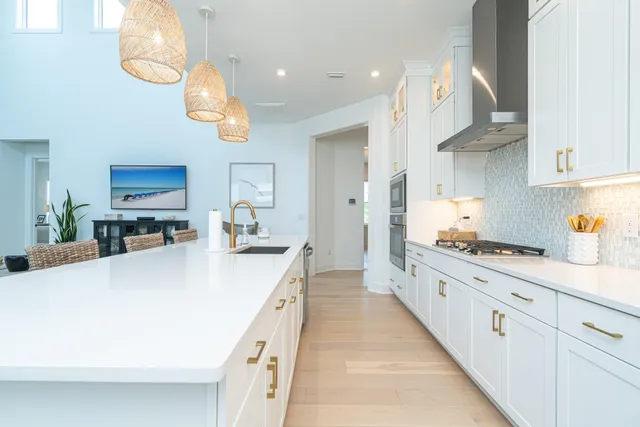 a view of a patio with chairs and plants