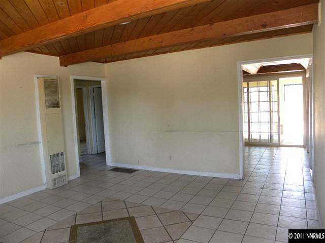 1755 Castle Way Reno, NV 89512 - Photo 3 of 10 a view of an empty room and window