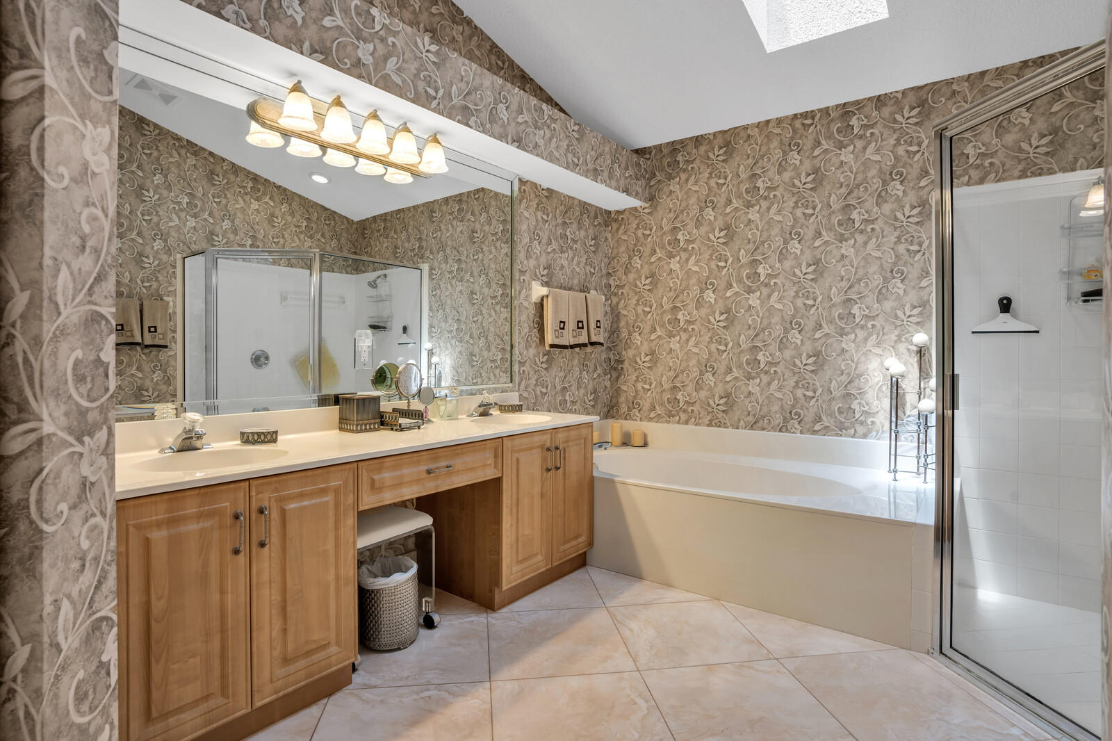 5153 Brookview Drive Boynton Beach, FL 33437 - Photo 23 of 44 a bathroom with a tub sink and mirror