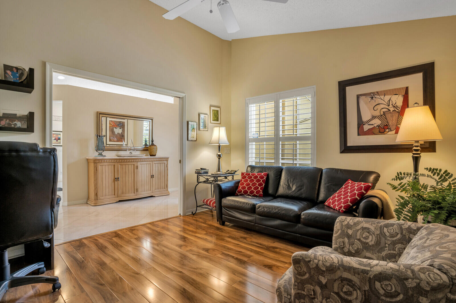 5153 Brookview Drive Boynton Beach, FL 33437 - Photo 29 of 44 a living room with furniture and a potted plant