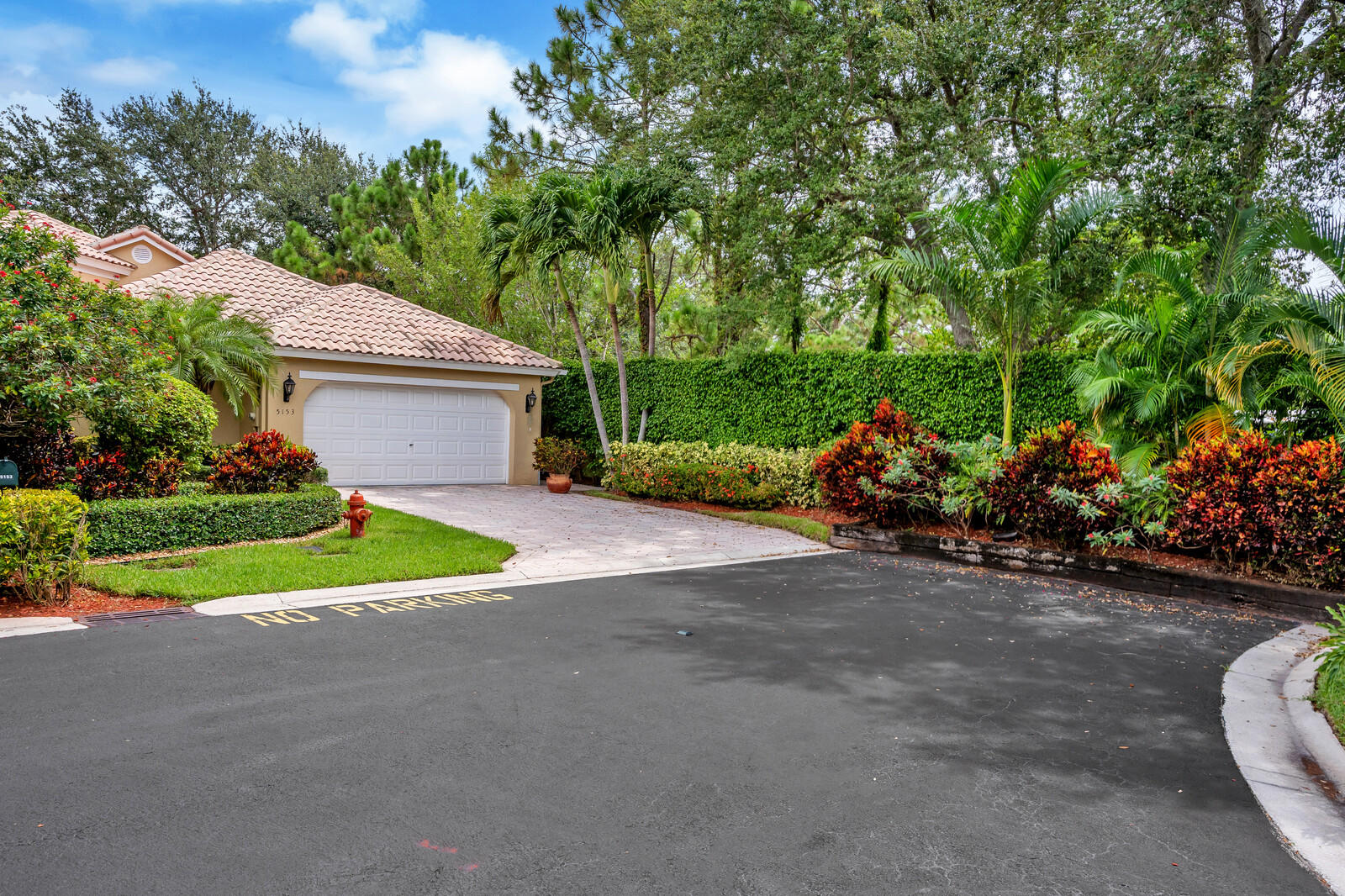 5153 Brookview Drive Boynton Beach, FL 33437 - Photo 4 of 44 a view of a backyard with plants and a garden