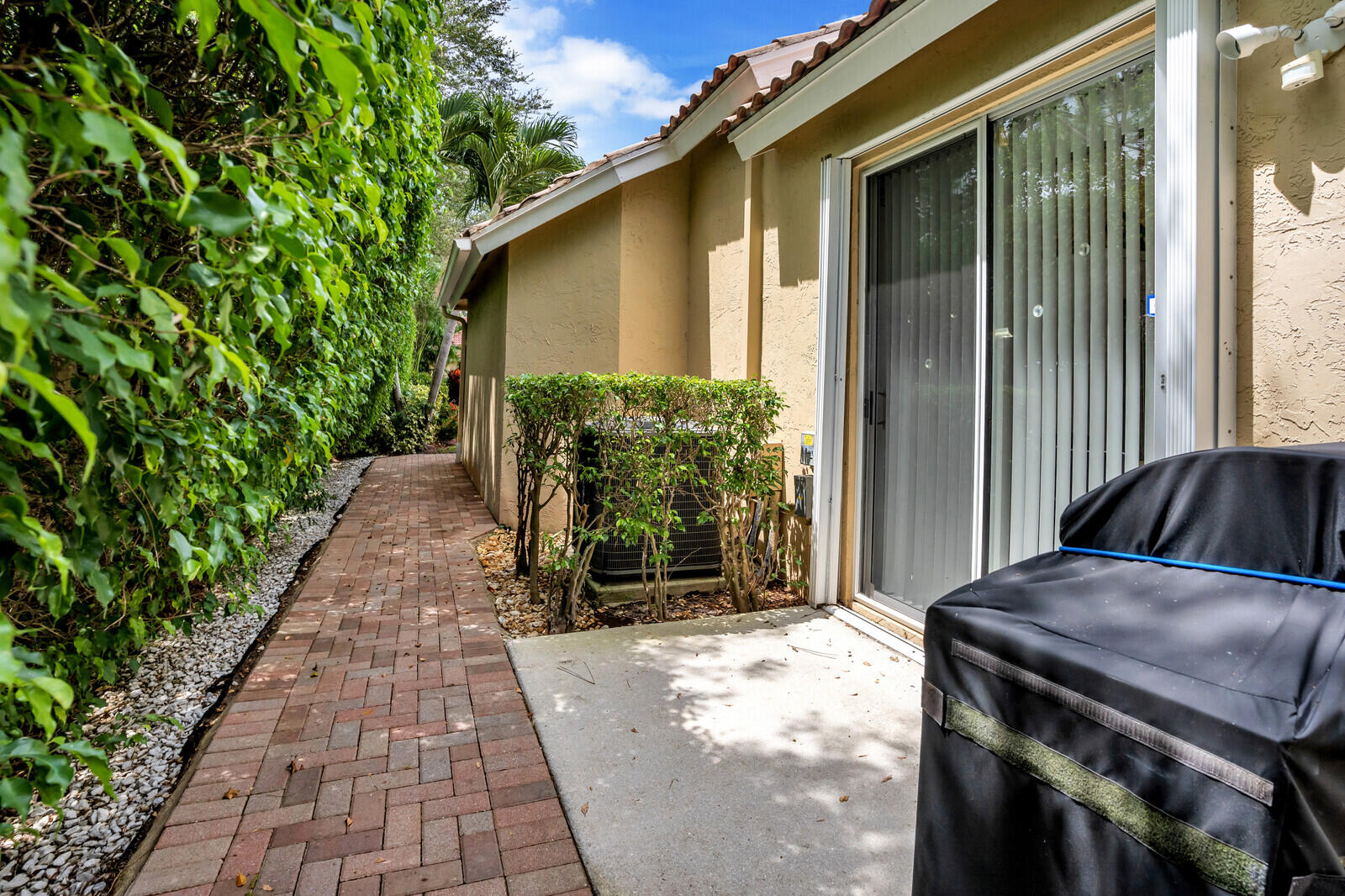 5153 Brookview Drive Boynton Beach, FL 33437 - Photo 35 of 44 a view of a backyard with pathway