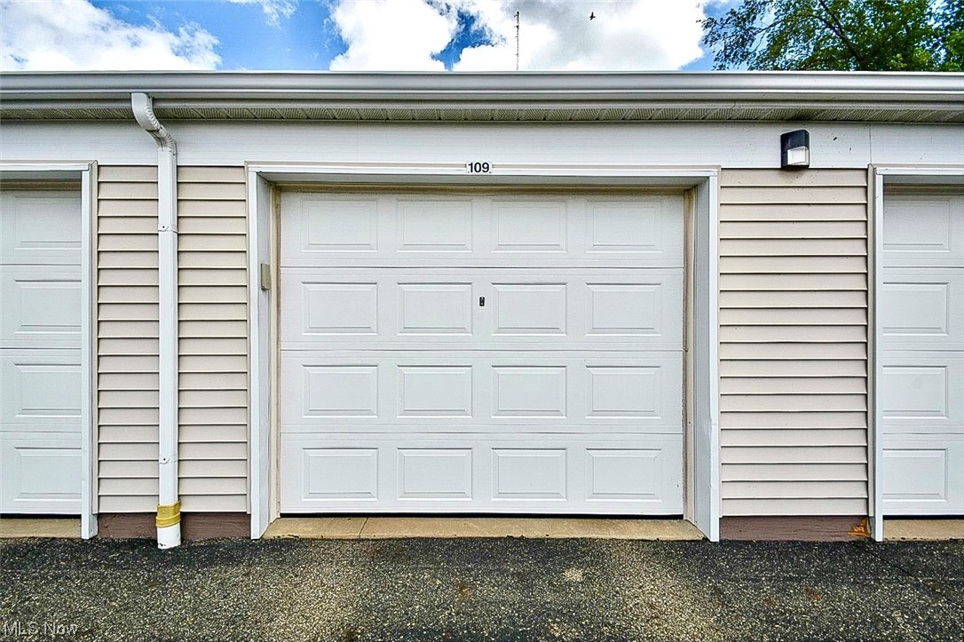 4703 Hills And Dales Road Northwest, Unit 109 Canton, OH 44708 - Photo 27 of 27 #109 Garage with opener.