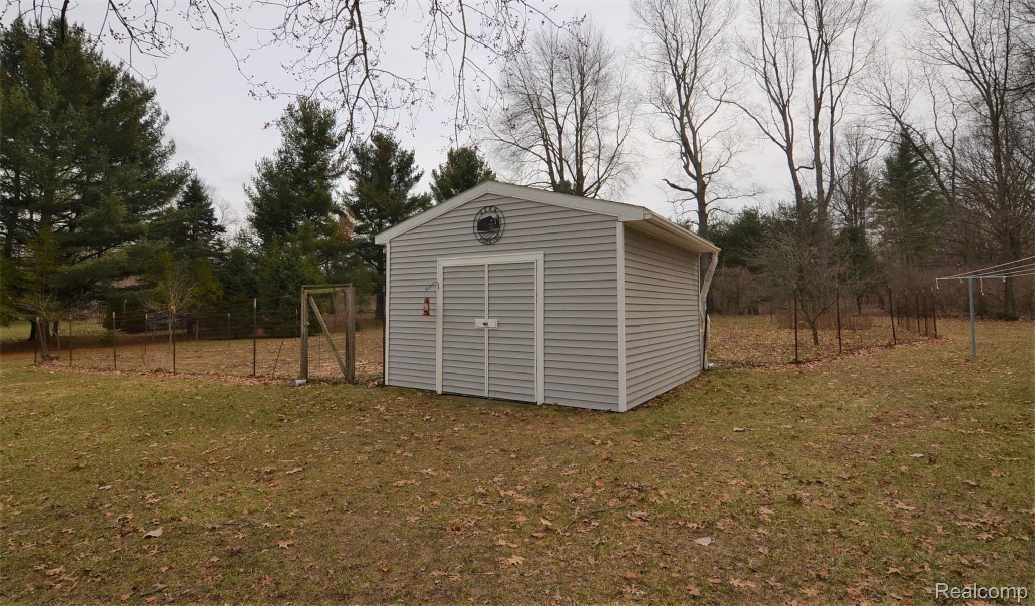 1470 East Rattalee Lake Road Holly, MI 48442 - Photo 15 of 19 LARGE SHED & GARDEN