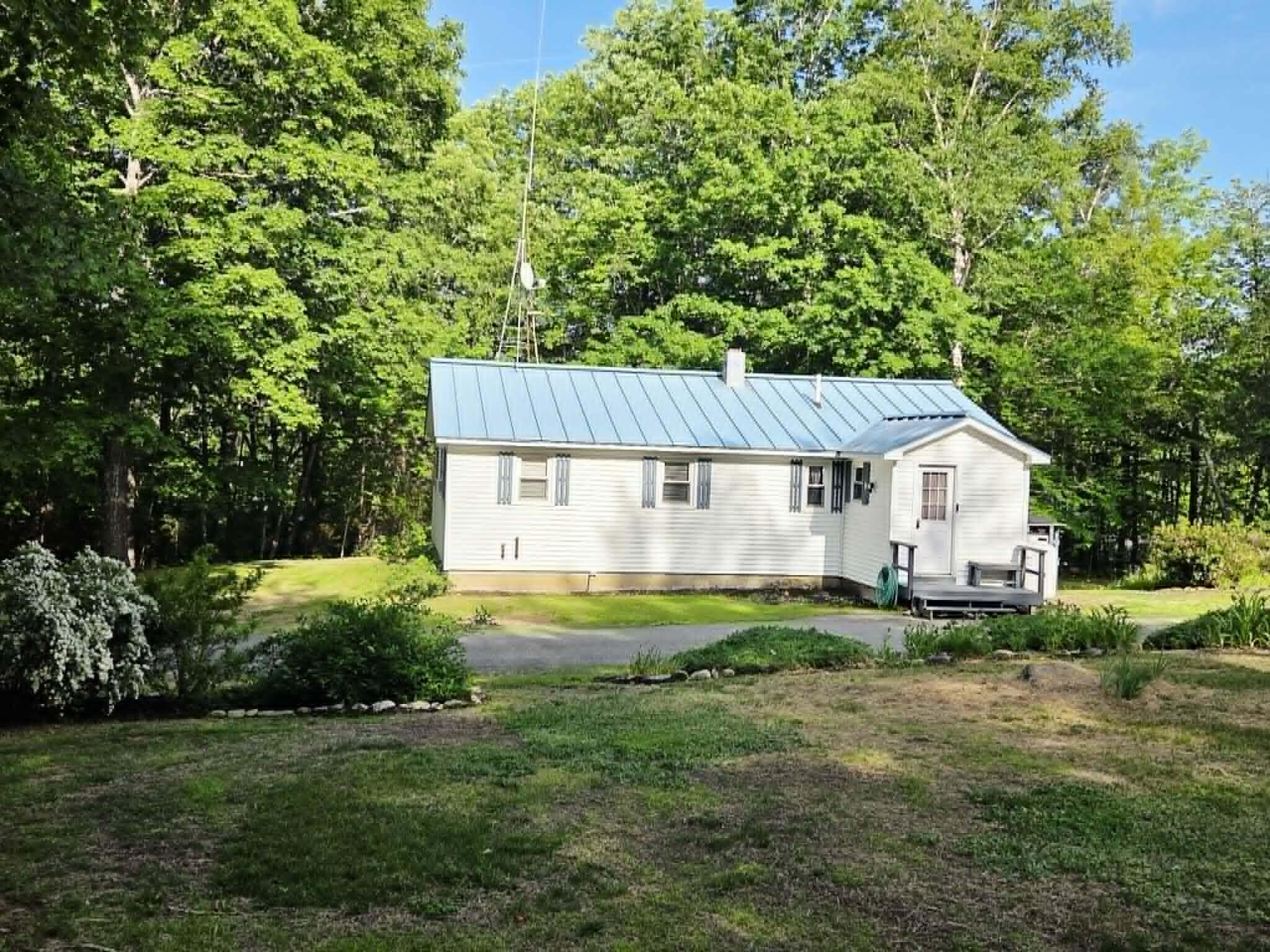 605 Tate Road Corinth, ME 04427 - Photo 1 of 47 front of house