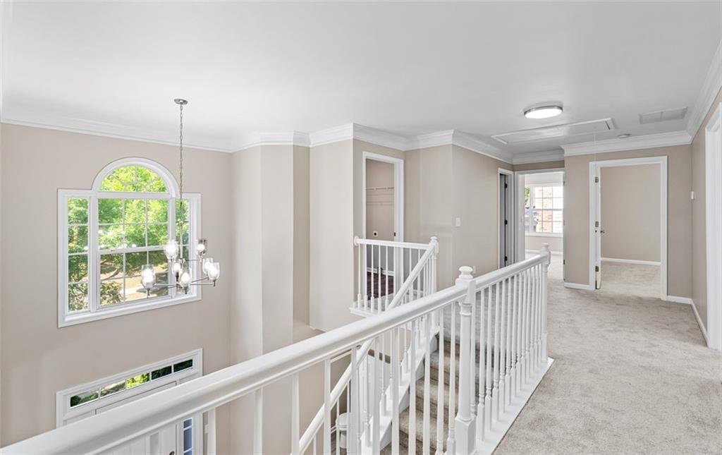 473 Greyhawk Way Fairburn, GA 30213 - Photo 27 of 34 a view of a hallway with a window