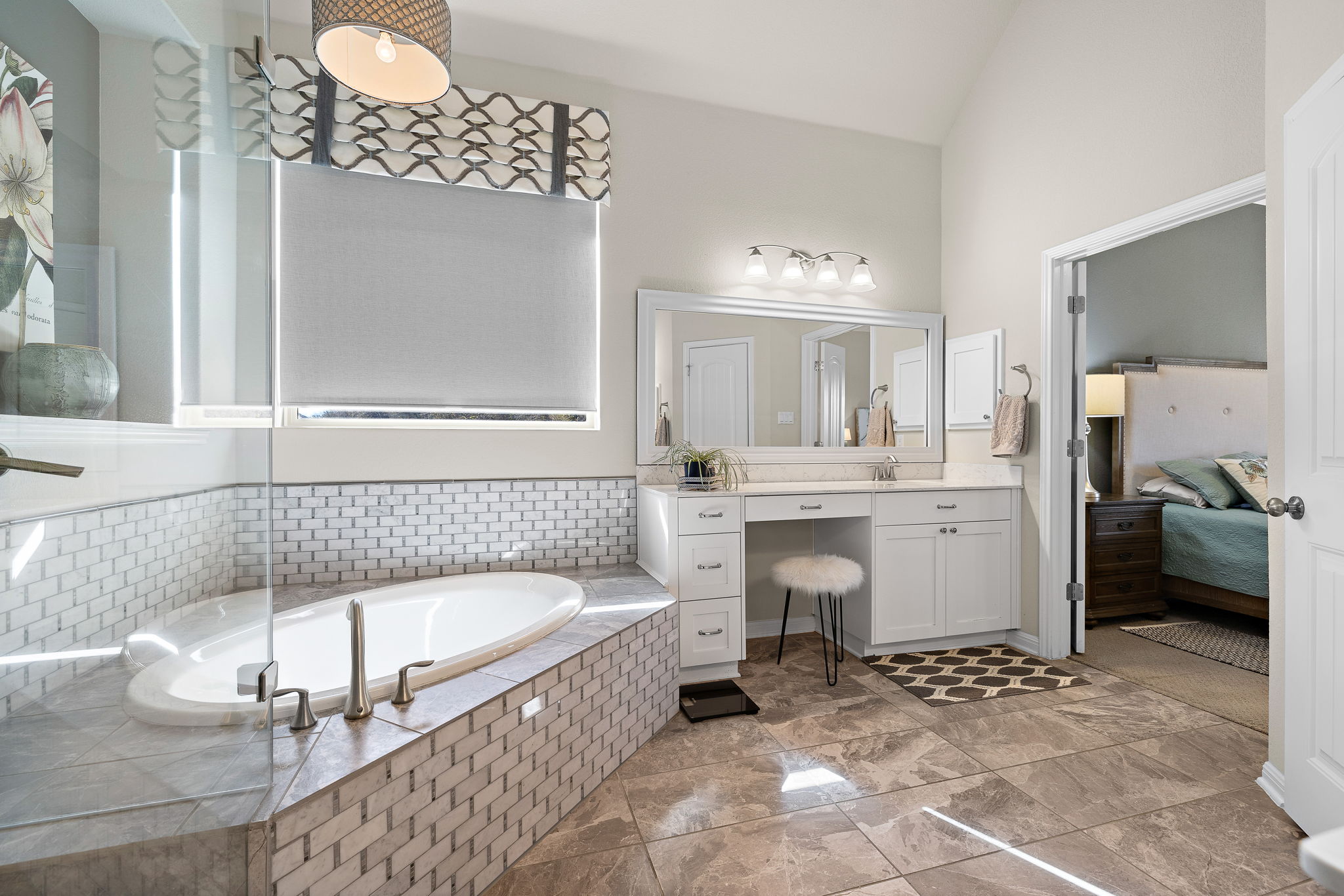 5016 Yucca Flower Lane Georgetown, TX 78626 - Photo 18 of 31 a bathroom with a bathtub sink and mirror