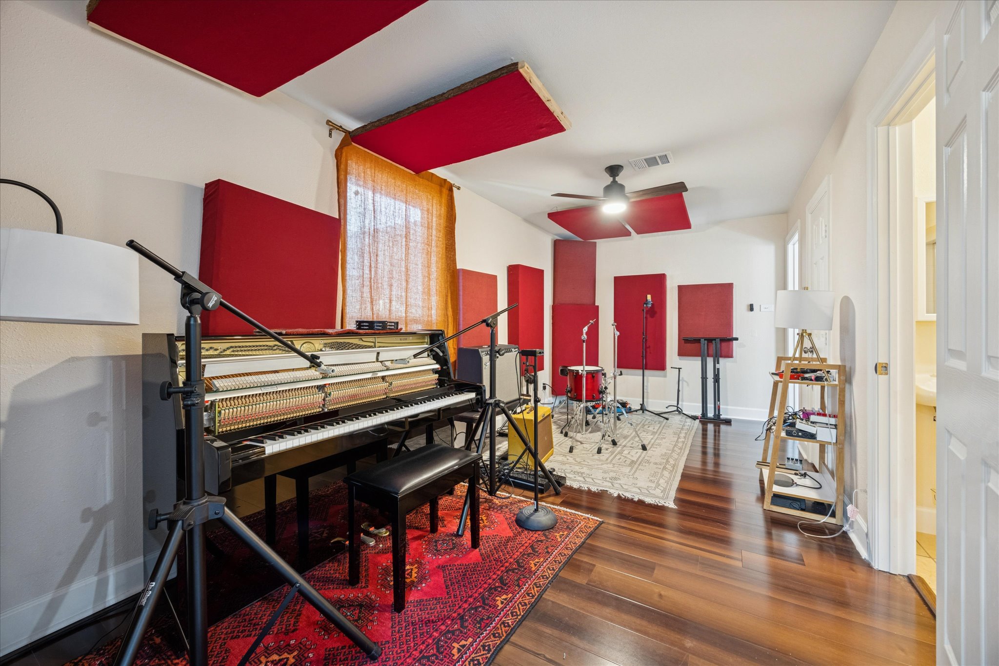 907 East 53rd Street Austin, TX 78751 - Photo 15 of 35 a room with musical instruments