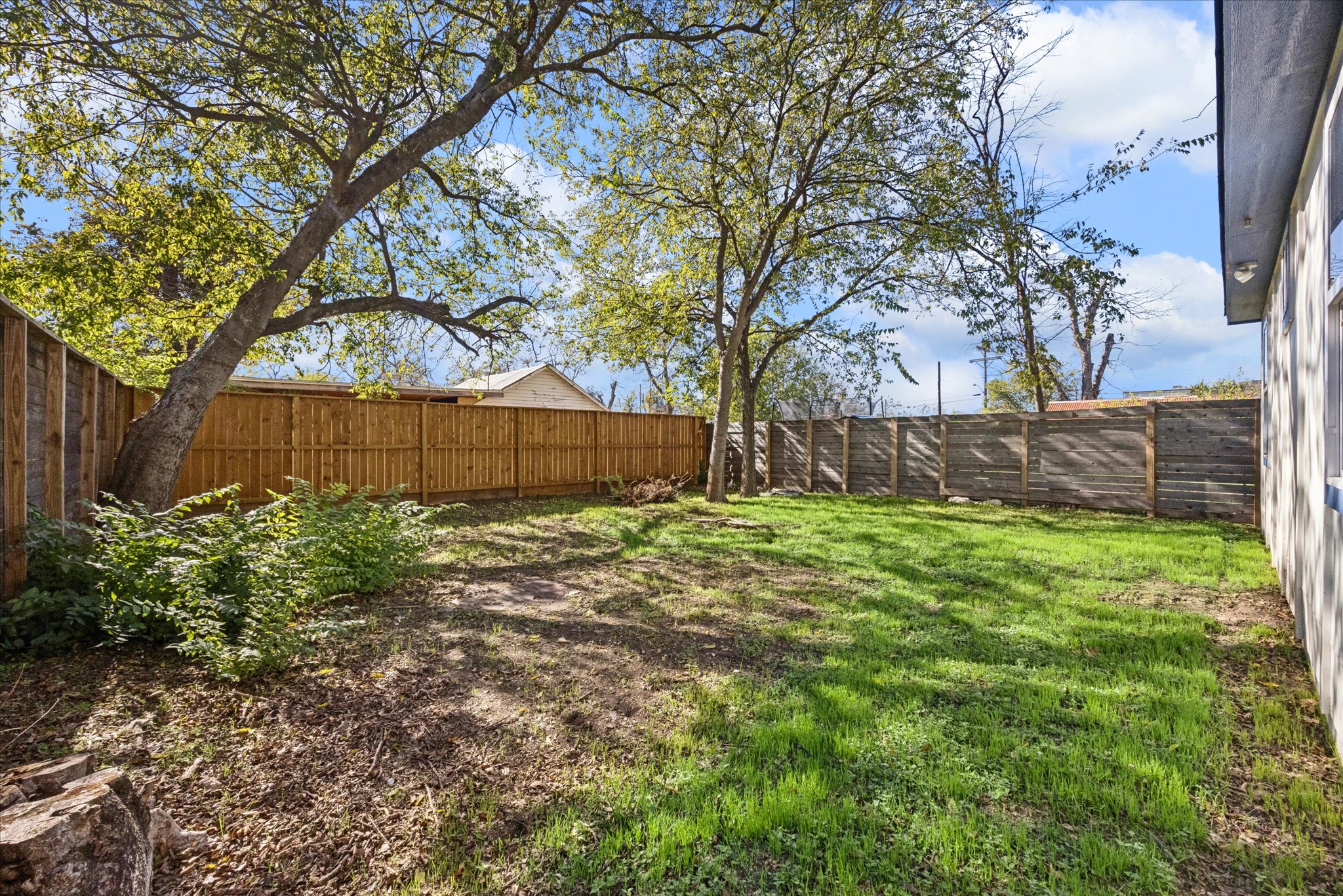 907 East 53rd Street Austin, TX 78751 - Photo 26 of 35 a front view of a house with garden