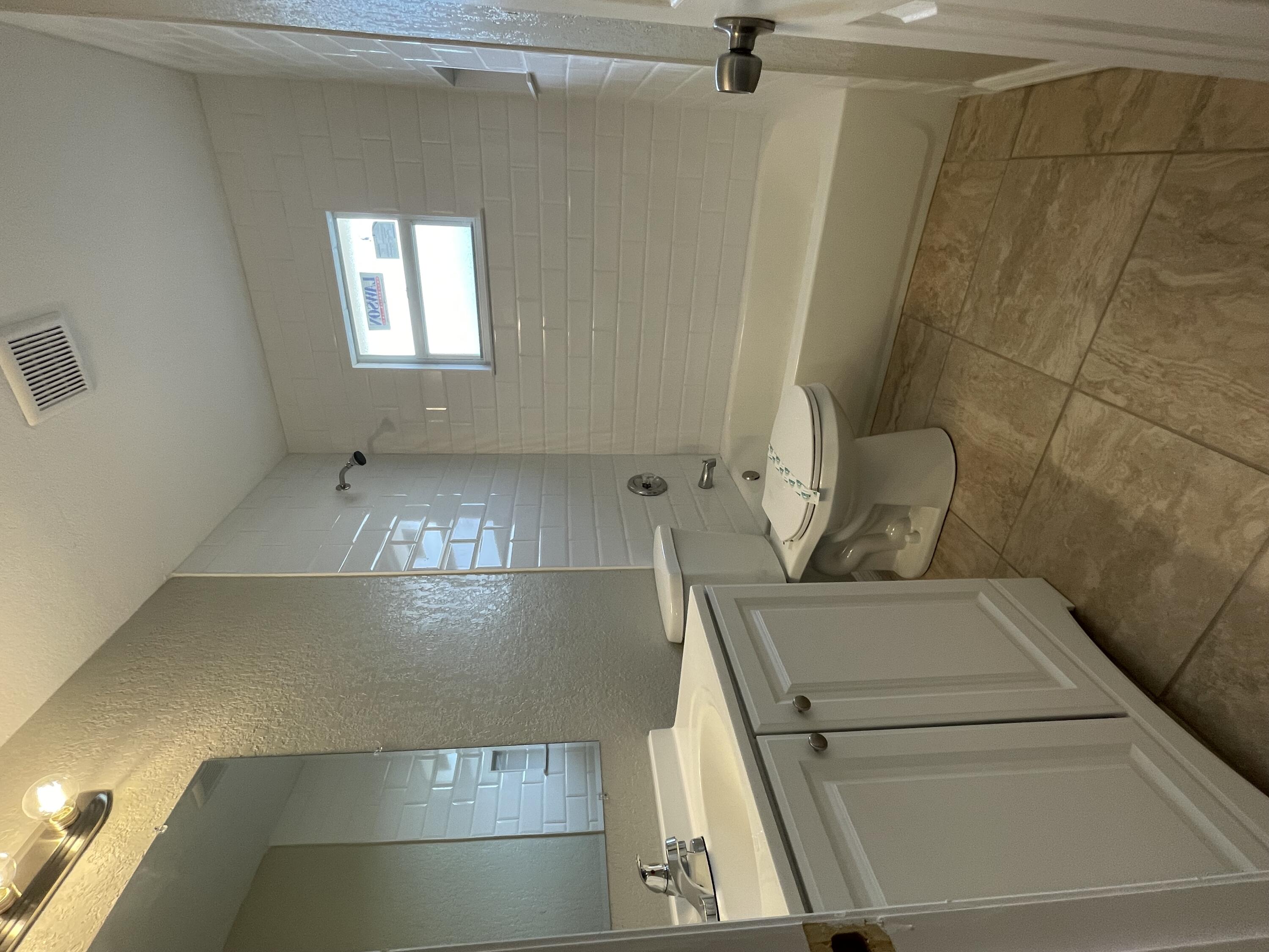 2880 Harson Way Fort Pierce, FL 34946 - Photo 29 of 40 a view of water heater room