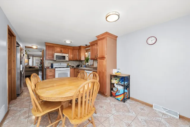 a view of a dining room with furniture