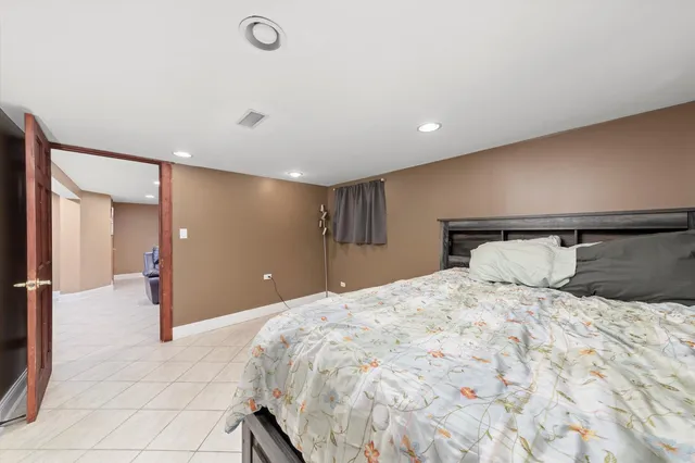 a large white bed in a white room