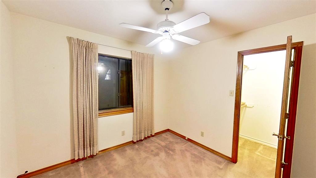 509 Topside Drive Azle, TX 76020 - Photo 13 of 19 an empty room with fan