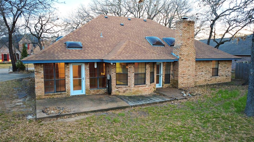 509 Topside Drive Azle, TX 76020 - Photo 19 of 19 a house view with a garden space