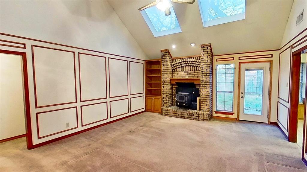 509 Topside Drive Azle, TX 76020 - Photo 6 of 19 a view of a livingroom with a fireplace