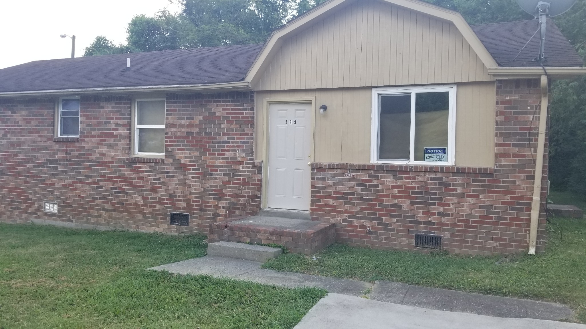 589 Judd Drive Nashville, TN 37218 - Photo 1 of 11 a front view of a house with brick walls