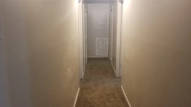 a bathroom with a sink toilet and a mirror