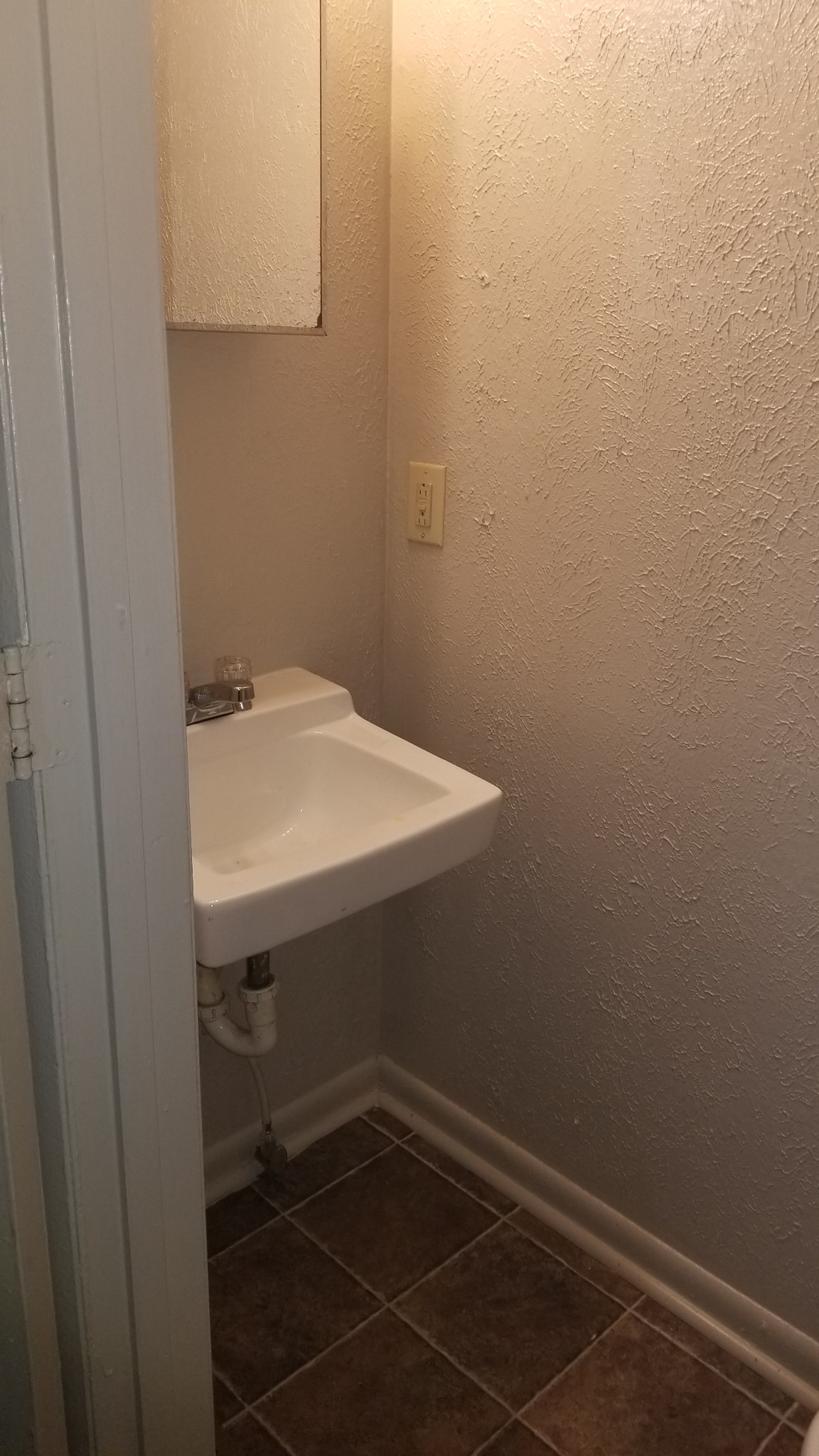 589 Judd Drive Nashville, TN 37218 - Photo 8 of 11 a bathroom with a sink and cabinets