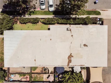 a view of swimming pool with a yard