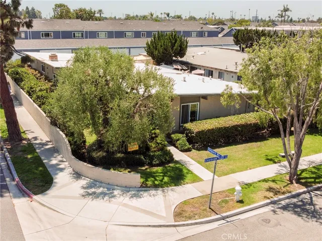 a view of a swimming pool with a bench in front of it