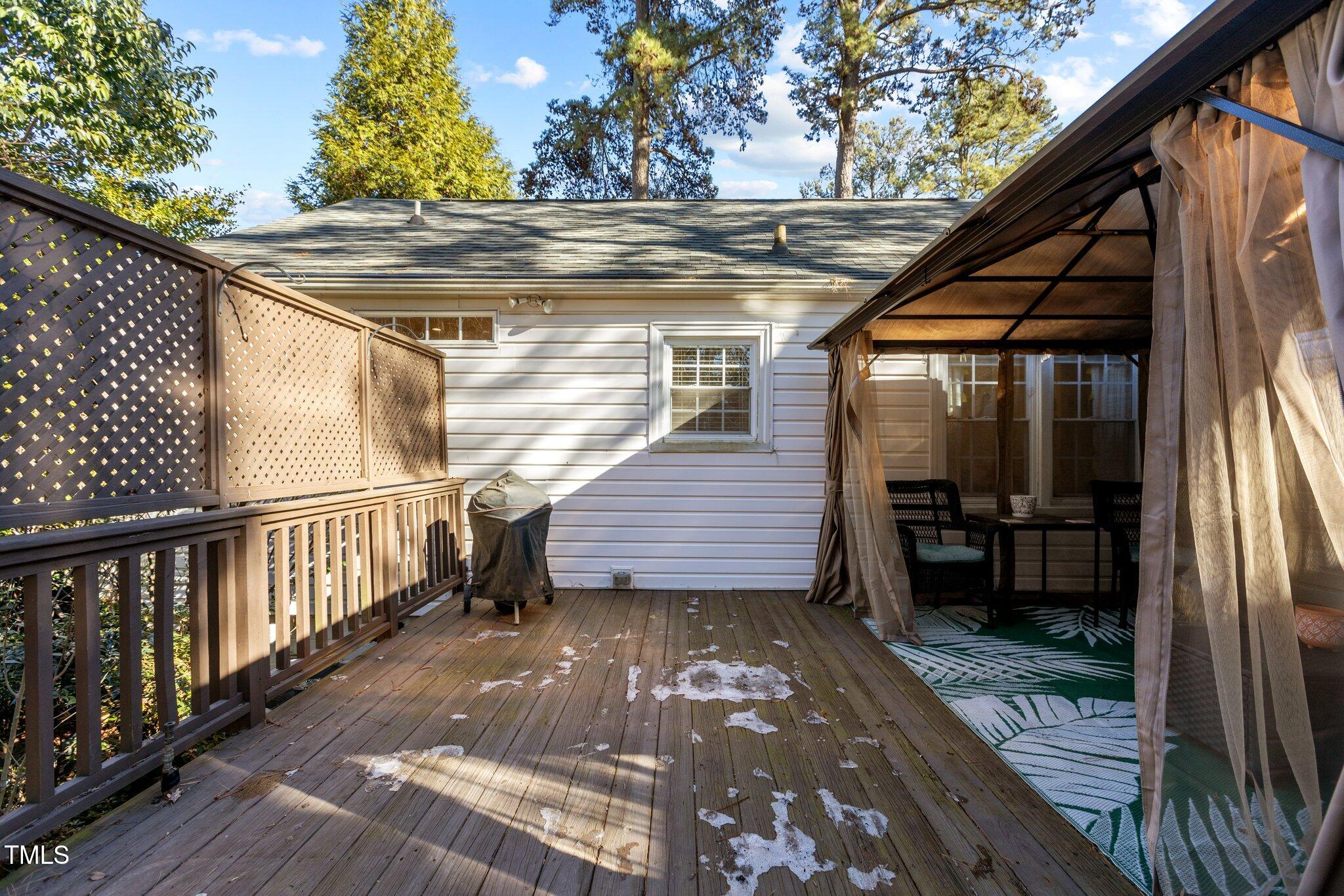 1325 Duplin Road Raleigh, NC 27607 - Photo 30 of 46 Great idea to have half the Deck open and a tent on the other half.