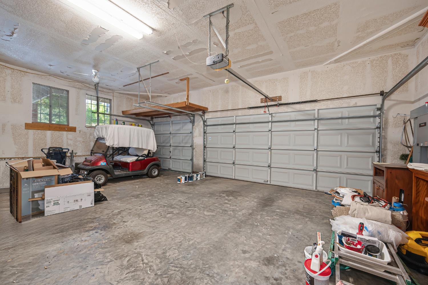22803 Sunset Ridge Drive Auburn, CA 95602 - Photo 36 of 60 Large three car garage with sink and work space.
