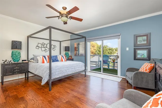 a bedroom with a bed and a couch