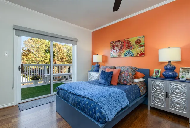 a bedroom with a bed and a view of bedroom