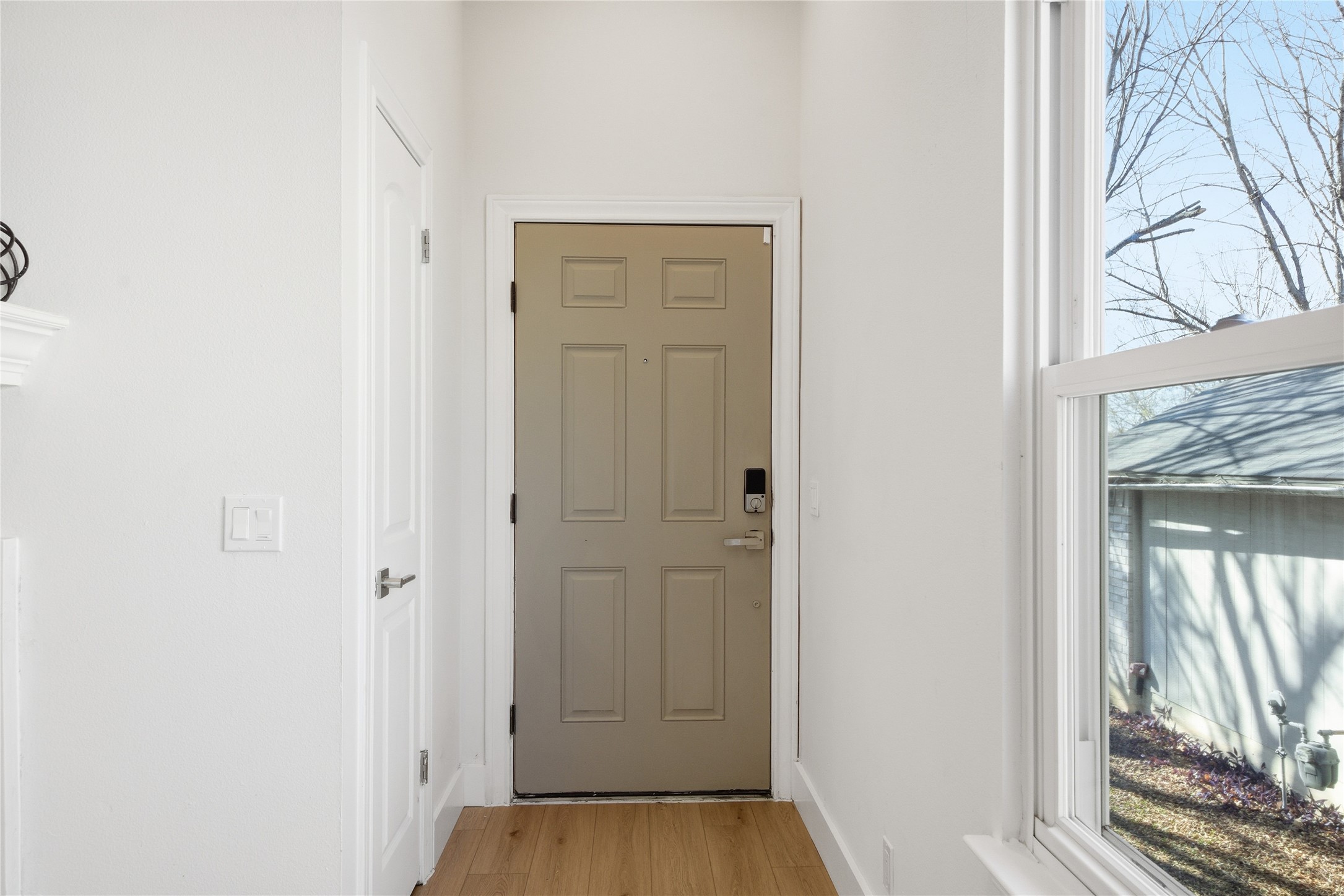 9019 Wellesley Drive Austin, TX 78754 - Photo 6 of 23 a view of a hallway with wooden floor