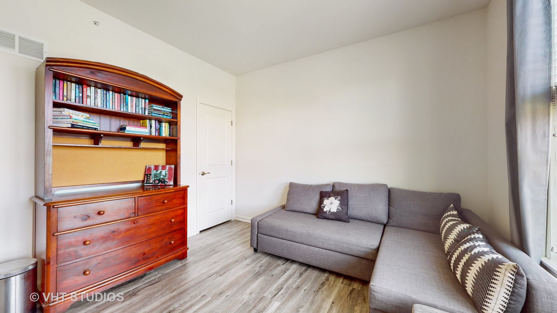 5841 Fairview Lane Hoffman Estates, IL 60192 - Photo 15 of 35 a living room with furniture and a shelf