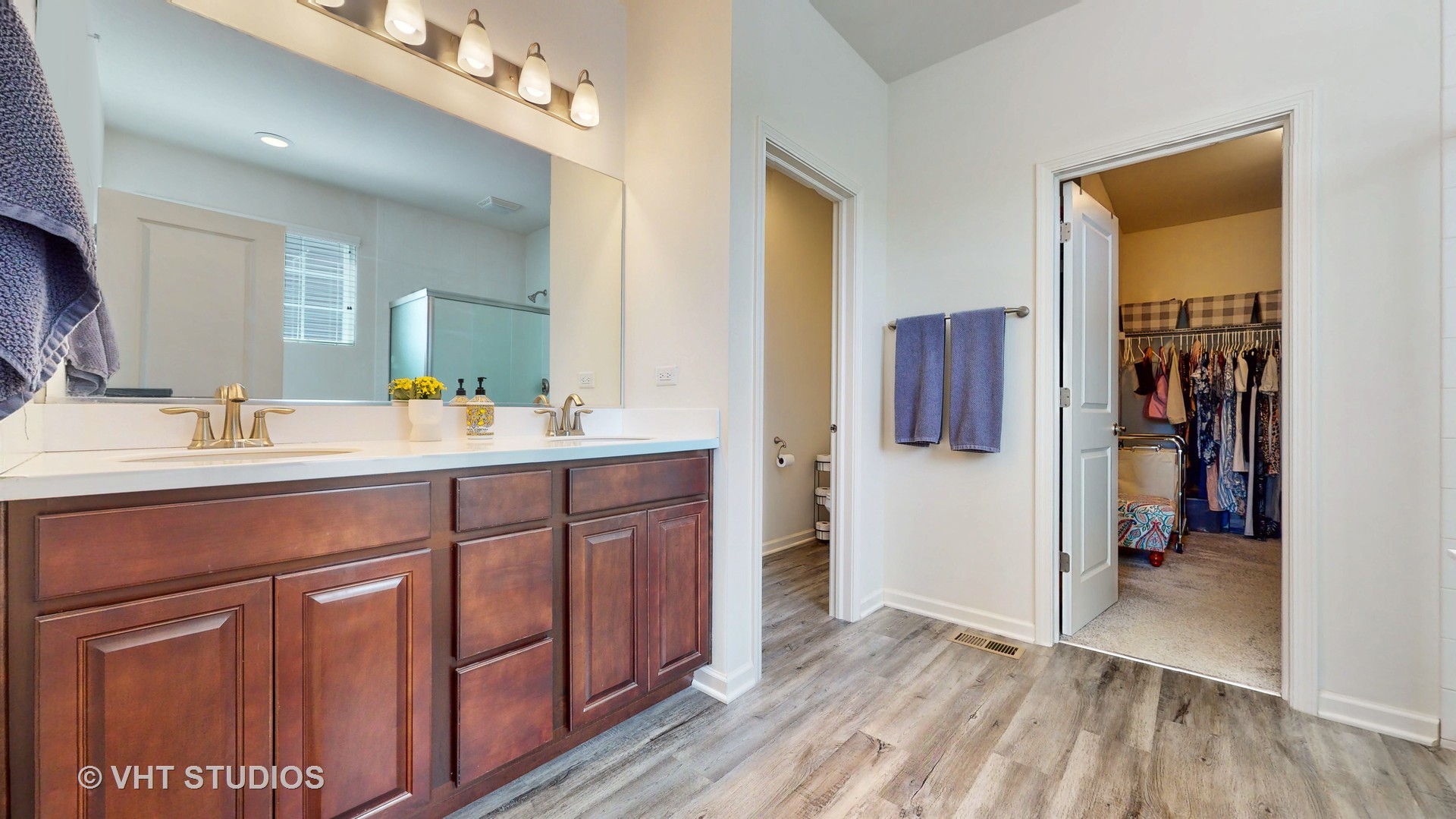 5841 Fairview Lane Hoffman Estates, IL 60192 - Photo 18 of 35 a spacious bathroom with a shower a sink and a mirror