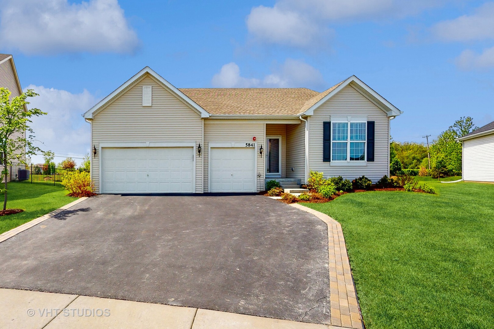 5841 Fairview Lane Hoffman Estates, IL 60192 - Photo 2 of 35 a front view of house with yard and green space