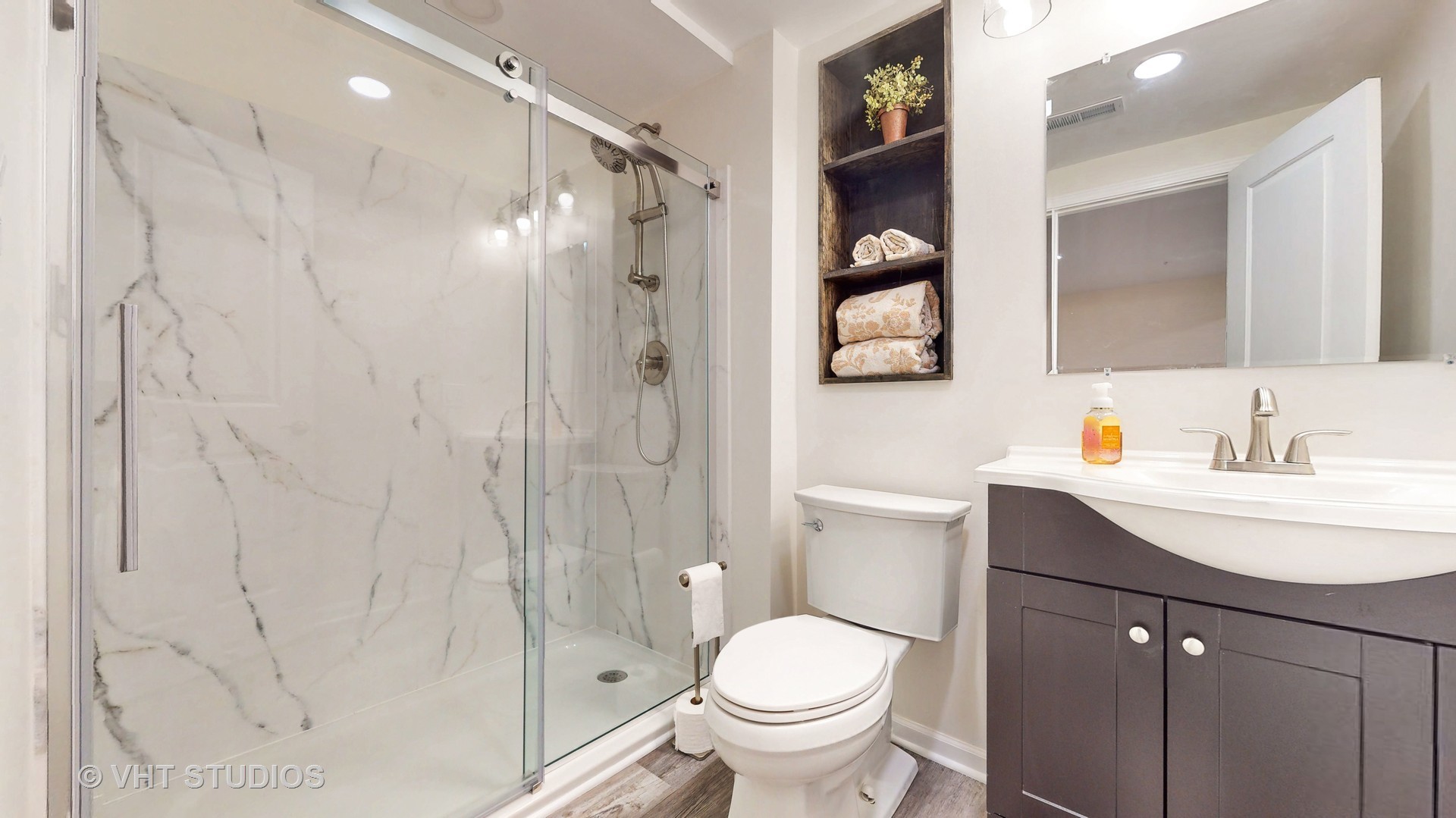 5841 Fairview Lane Hoffman Estates, IL 60192 - Photo 30 of 35 a bathroom with a sink toilet and shower